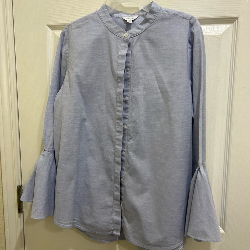 Calvin Klein  with medium Chinese  collar beck with stylistic design at arm end